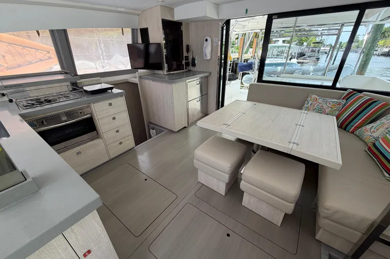 Slide: The Image of Modern interior of 2020 Leopard 40 catamaran with kitchen and dining area. - 40