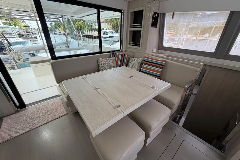 Slide: The Image of Modern interior of a 2020 Leopard 40 catamaran with a cozy dining area. - 41