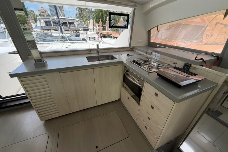 Slide: The Image of Modern kitchen interior of 2020 Leopard 40 yacht with stove, oven, and sink. - 43