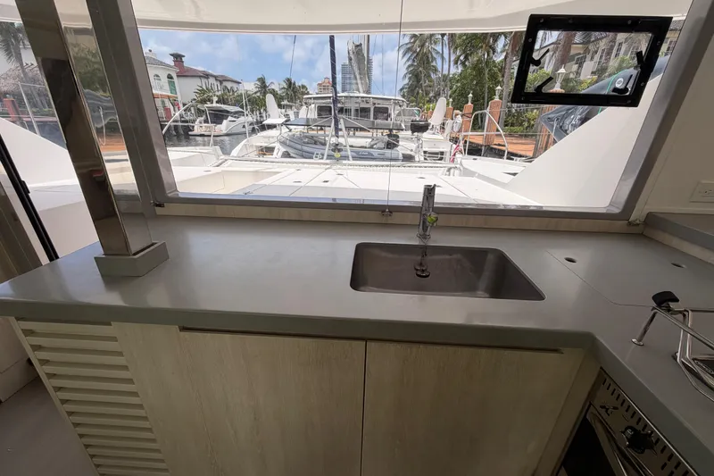 Slide: The Image of Modern kitchen interior on a 2020 Leopard 40 catamaran with marina view. - 44