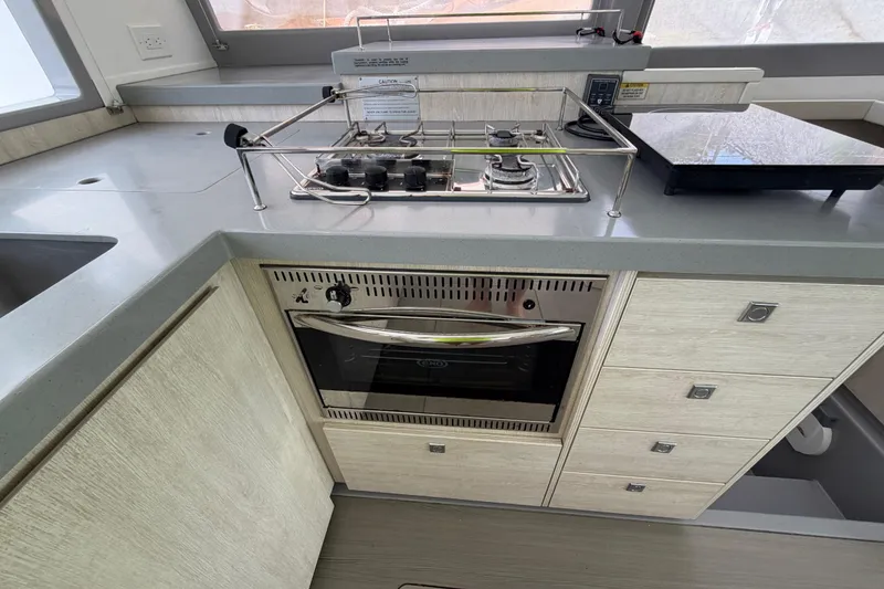 Slide: The Image of Modern kitchen in a 2020 Leopard 40 yacht with stove and oven. - 45