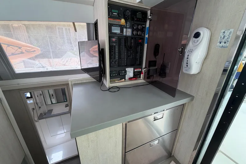 Slide: The Image of Interior of a 2020 Leopard 40 yacht featuring navigation equipment and control panel. - 49