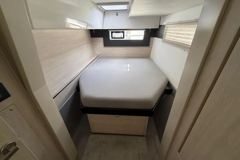 Slide: The Image of 2020 Leopard 40 yacht cabin with a cozy bed and modern interior design. - 58