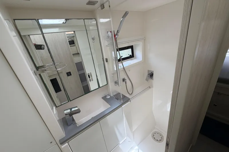 Slide: The Image of Modern bathroom in a 2020 Leopard 40 yacht with sleek fixtures and a shower. - 60