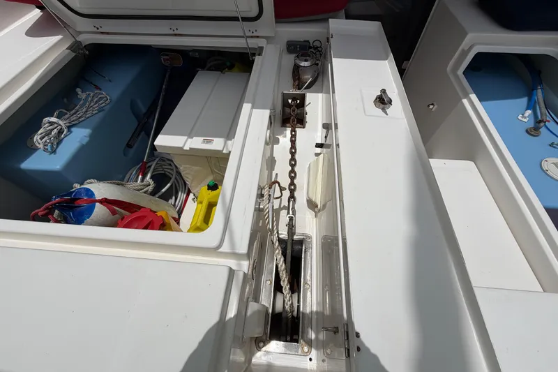 Slide: The Image of Storage compartments and anchor chain on a 2020 Leopard 40 catamaran deck. - 80