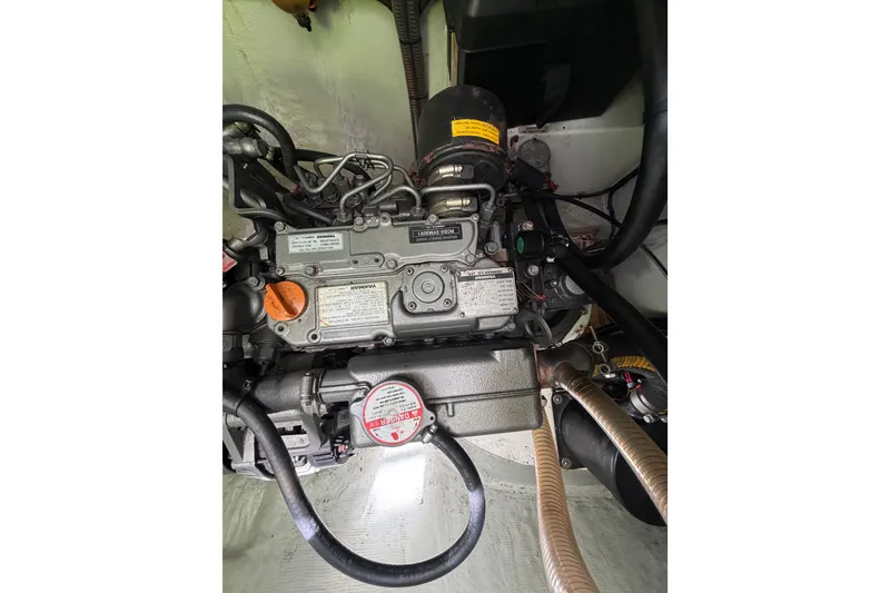 Slide: The Image of Engine compartment of a 2020 Leopard 40, showcasing detailed mechanical components. - 85
