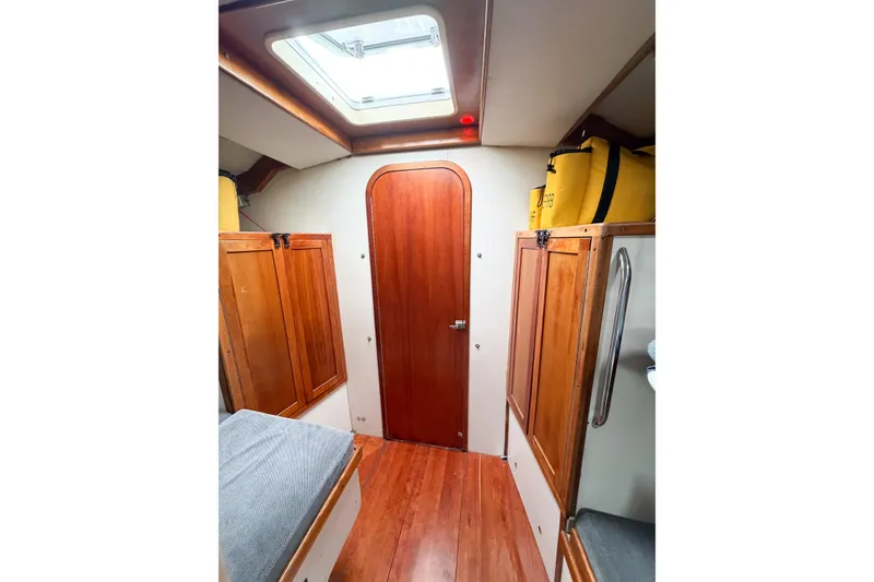 Slide: The Image of Interior of 1998 Limited Edition Hike Metal boat with wooden cabinets and skylight. - 10