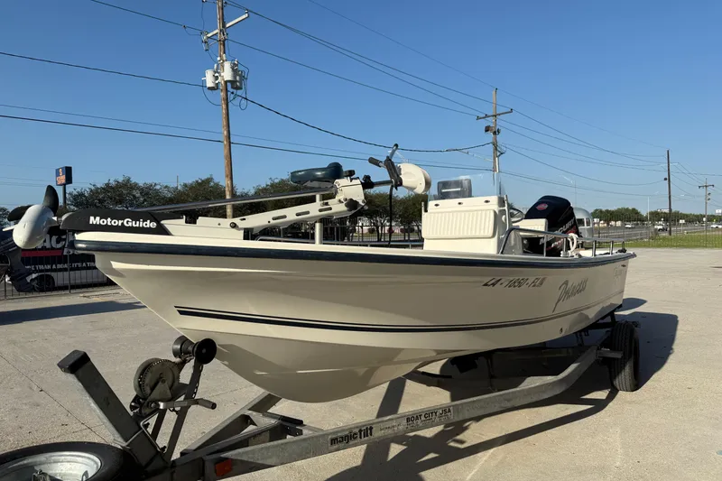Slide: The Image of 2006 Sea Boss 21 Bay Boat on trailer with MotorGuide trolling motor. - 4