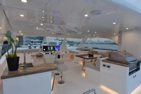 Slide: The Image of Luxurious interior of 2022 Horizon PC65 yacht with modern amenities and elegant design. - 12