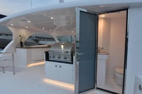 Slide: The Image of Luxury Horizon PC65 yacht with outdoor kitchen and bathroom, 2022 model. - 23