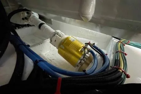 Slide: The Image of Engine compartment of 2022 Horizon PC65 with visible cables and machinery components. - 29