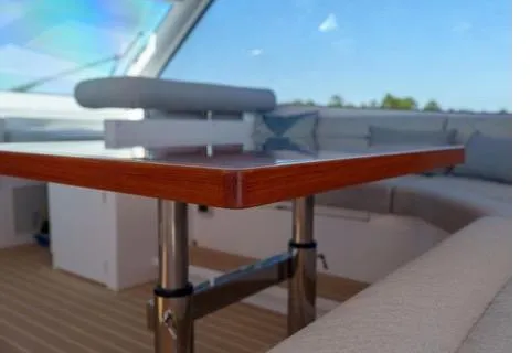 Slide: The Image of Luxurious Horizon PC65 yacht interior with wooden table, 2022 model. - 36