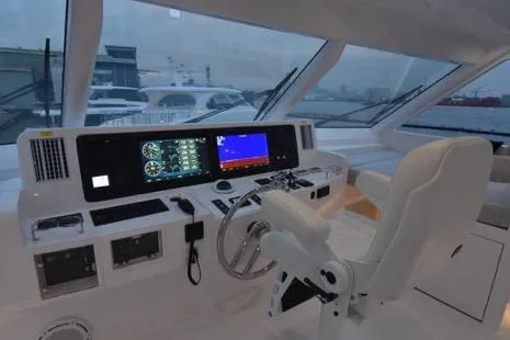 Slide: The Image of Modern yacht cockpit with advanced navigation systems, Horizon PC65, 2022 model. - 39