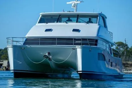 Slide: The Image of 2022 Horizon PC65 yacht on water, showcasing sleek design and modern features. - 5