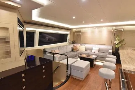 Slide: The Image of Luxurious interior of 2022 Horizon PC65 yacht with modern seating and elegant lighting. - 54