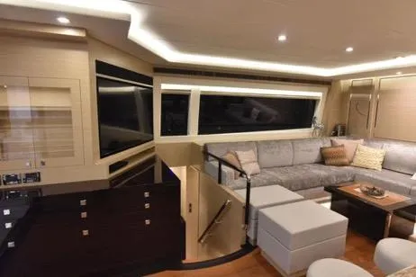 Slide: The Image of Luxurious interior of 2022 Horizon PC65 yacht with modern seating and ambient lighting. - 56
