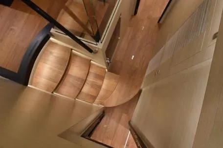 Slide: The Image of Modern wooden staircase in 2022 Horizon PC65 yacht interior. - 59