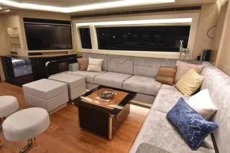 Slide: The Image of Luxurious interior of 2022 Horizon PC65 yacht with modern seating and elegant decor. - 61