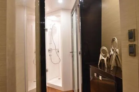 Slide: The Image of Luxurious bathroom interior on 2022 Horizon PC65 yacht, featuring modern shower and elegant decor. - 67