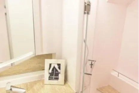 Slide: The Image of Modern bathroom with shower, mirror, and framed picture; Horizon PC65, 2022 model. - 68