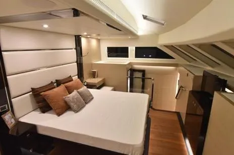 Slide: The Image of Luxurious bedroom interior in 2022 Horizon PC65 yacht, featuring modern design and elegant furnishings. - 73