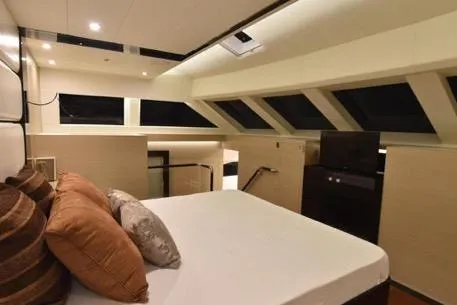 Slide: The Image of Luxurious bedroom interior on 2022 Horizon PC65 yacht with modern design and large windows. - 75