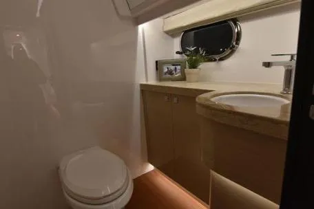Slide: The Image of Luxurious bathroom in 2022 Horizon PC65 yacht with modern fixtures and elegant design. - 78