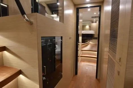 Slide: The Image of Luxurious interior of 2022 Horizon PC65 yacht with modern design and elegant lighting. - 79