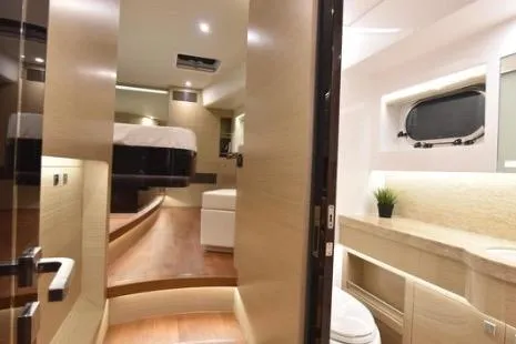 Slide: The Image of Luxurious interior of 2022 Horizon PC65 yacht with modern design and elegant furnishings. - 80