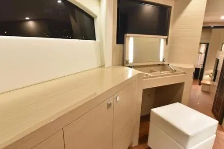 Slide: The Image of Modern interior of 2022 Horizon PC65 yacht with sleek cabinetry and seating. - 85