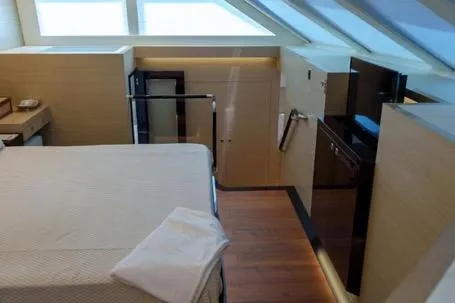 Slide: The Image of Luxurious interior of 2022 Horizon PC65 yacht with modern amenities and sleek design. - 97