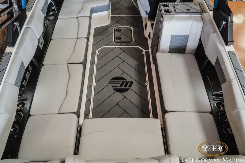 Slide: The Image of 2023 Malibu Wakesetter 25 LSV interior with spacious seating and modern design. - 10