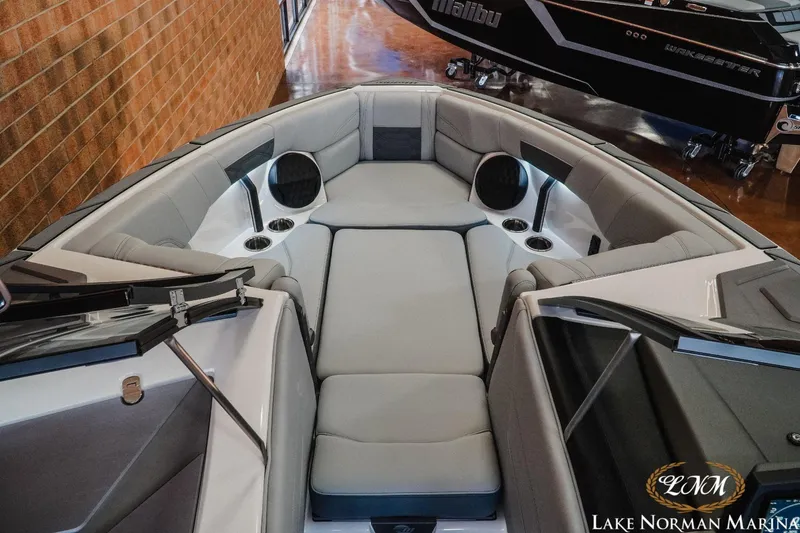 Slide: The Image of 2023 Malibu Wakesetter 25 LSV boat interior with luxurious seating at Lake Norman Marina. - 15