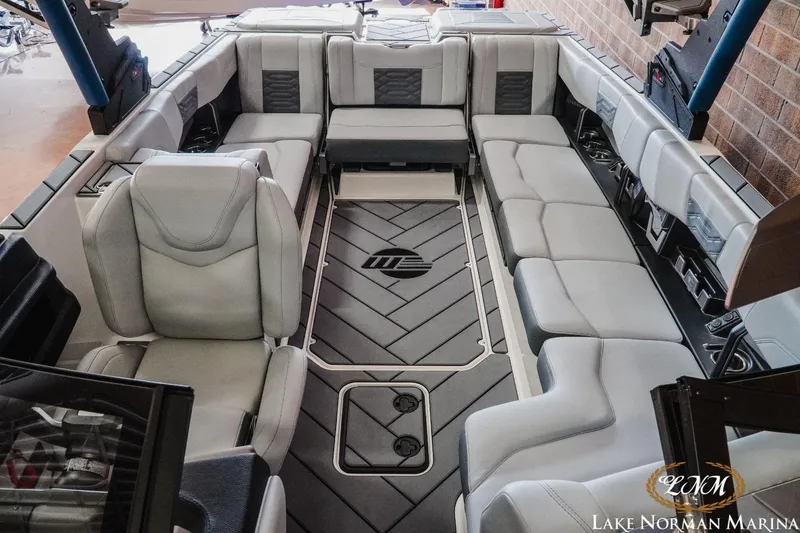 Slide: The Image of 2023 Malibu Wakesetter 25 LSV interior with luxurious seating and modern design. - 17