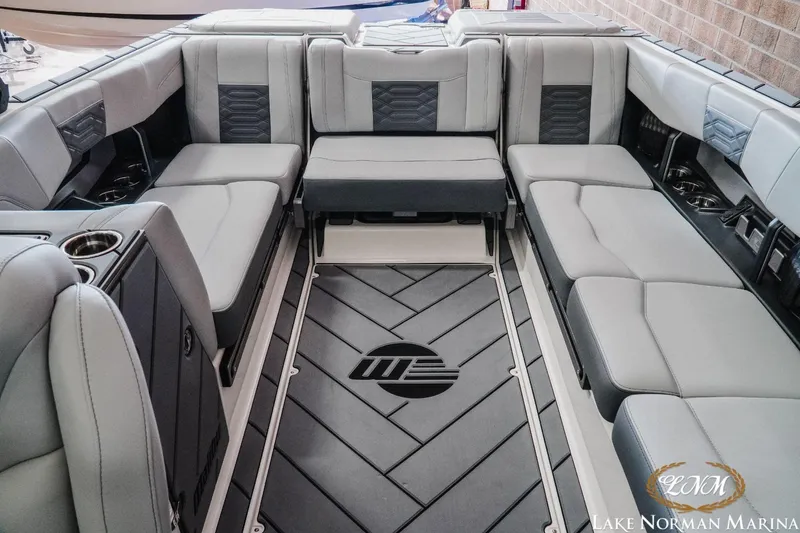 Slide: The Image of 2023 Malibu Wakesetter 25 LSV interior with luxurious seating and modern design. - 18