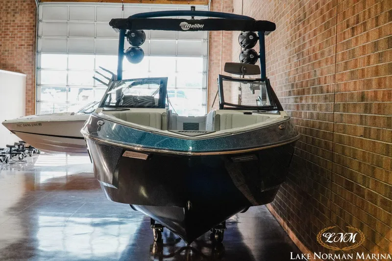 Slide: The Image of 2023 Malibu Wakesetter 25 LSV displayed at Lake Norman Marina indoors. - 4