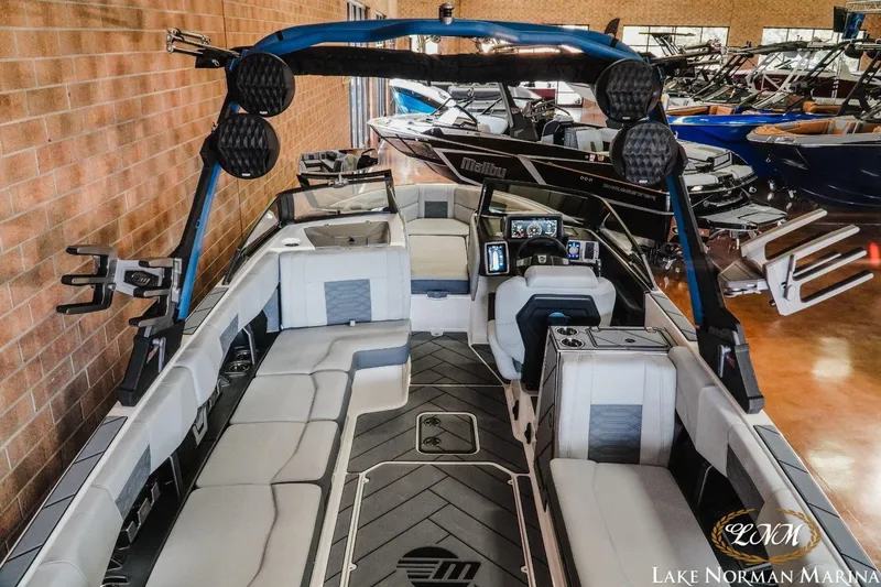 Slide: The Image of 2023 Malibu Wakesetter 25 LSV boat interior at Lake Norman Marina showroom. - 8