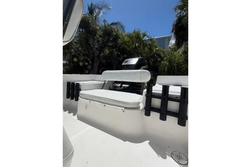 Slide: The Image of 2006 Sea Fox 187 Center Console boat interior with seating and rod holders. - 12