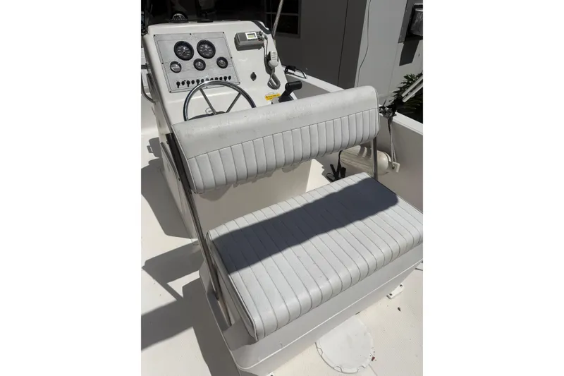 Slide: The Image of 2006 Sea Fox 187 Center Console boat interior with steering wheel and seating. - 14