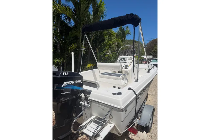 Slide: The Image of 2006 Sea Fox 187 Center Console boat with Mercury outboard motor, parked outdoors. - 7