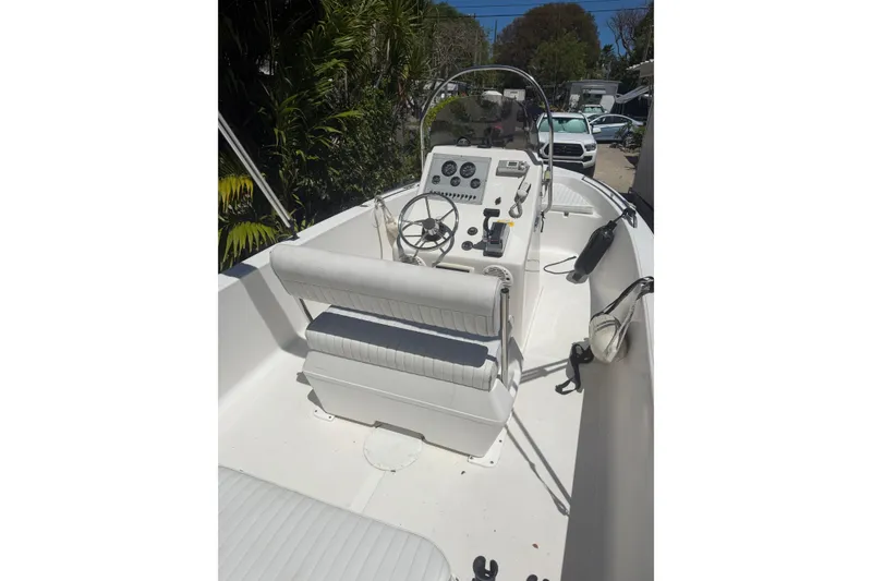 Slide: The Image of 2006 Sea Fox 187 Center Console boat interior with steering wheel and control panel. - 9