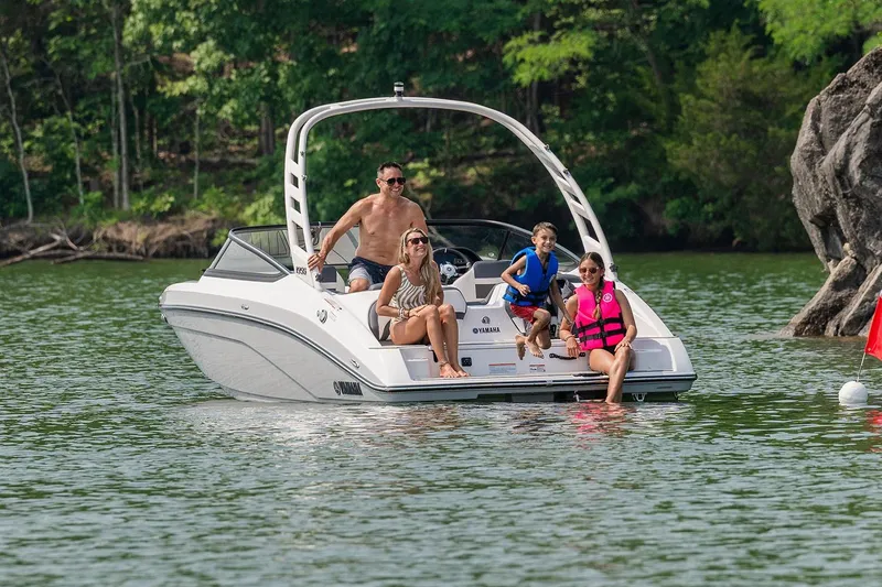 Slide: The Image of Manufacturer Provided Image: Family enjoying a day on a 2026 Yamaha Boats 195S in a scenic lake. - 15