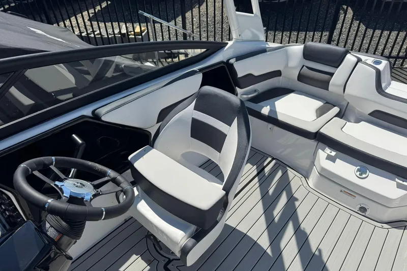 Slide: The Image of 2026 Yamaha Boats 195S interior with sleek seating and modern steering wheel design. - 3