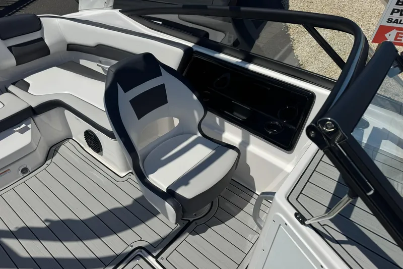 Slide: The Image of Interior of 2026 Yamaha Boats 195S, featuring sleek seating and modern dashboard design. - 4