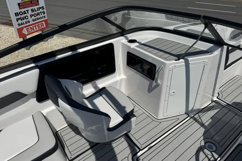 Slide: The Image of Interior view of 2026 Yamaha Boats 195S, featuring seating and dashboard details. - 5