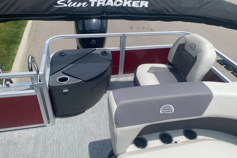 Slide: The Image of 2026 Sun Tracker Bass Buggy 18 DLX interior with seating and storage features. - 6