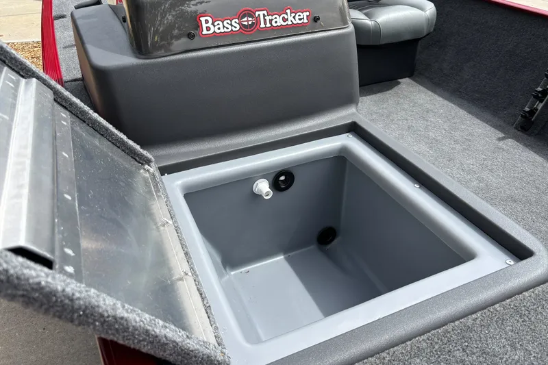 Slide: The Image of Open storage compartment in 2026 Tracker Bass Tracker Classic XL boat interior. - 13