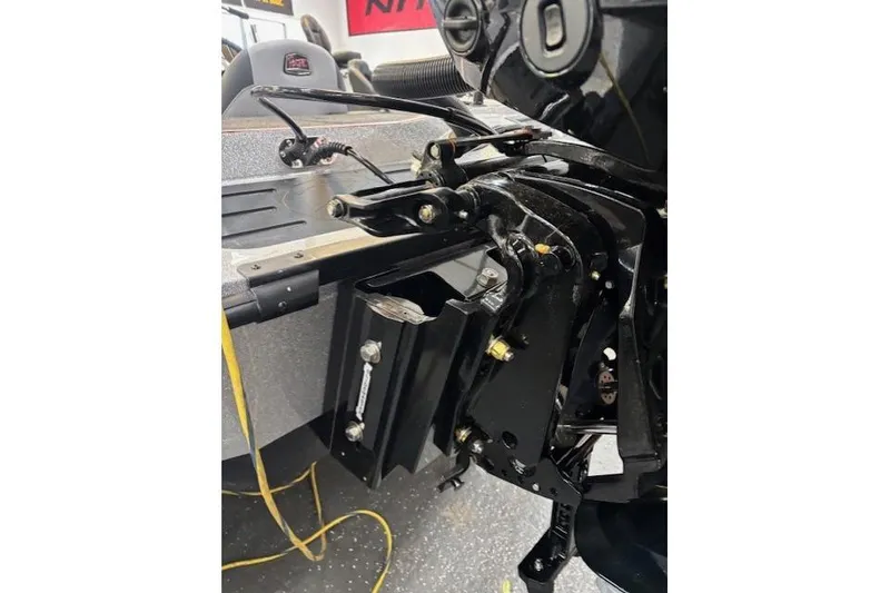Slide: The Image of 2026 Ranger Z518 boat motor mount detail with cables and components. - 12