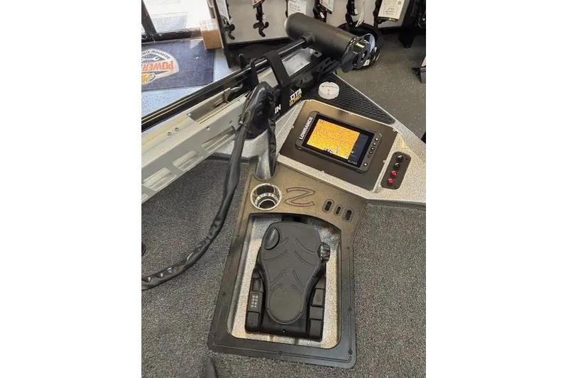 Slide: The Image of 2026 Ranger Z518 boat console with Lowrance fishfinder and Minn Kota trolling motor controls. - 15