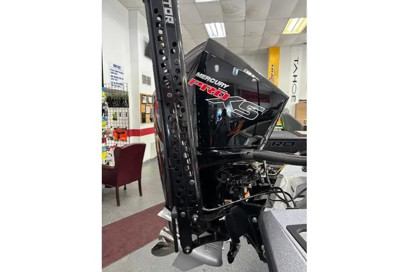 Slide: The Image of 2026 Ranger Z518 boat with Mercury Pro XS engine in showroom. - 9